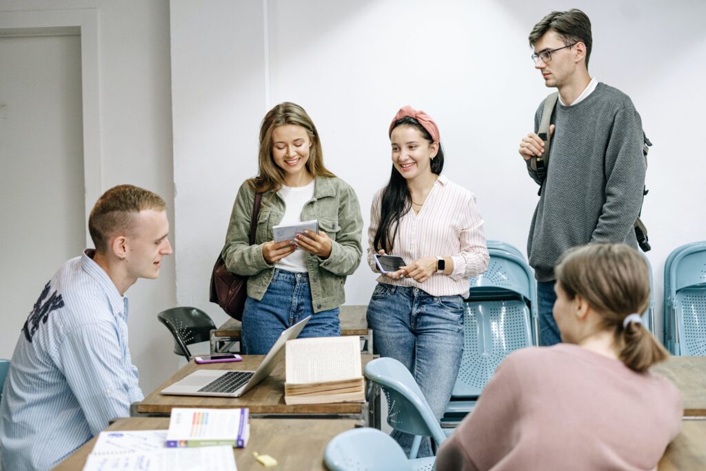 five high school students in a classroom